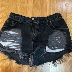 Vintage Levi’s black distressed denim shorts